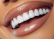 Close up a woman's beautiful smile.