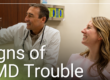 Doctor smiling with patient